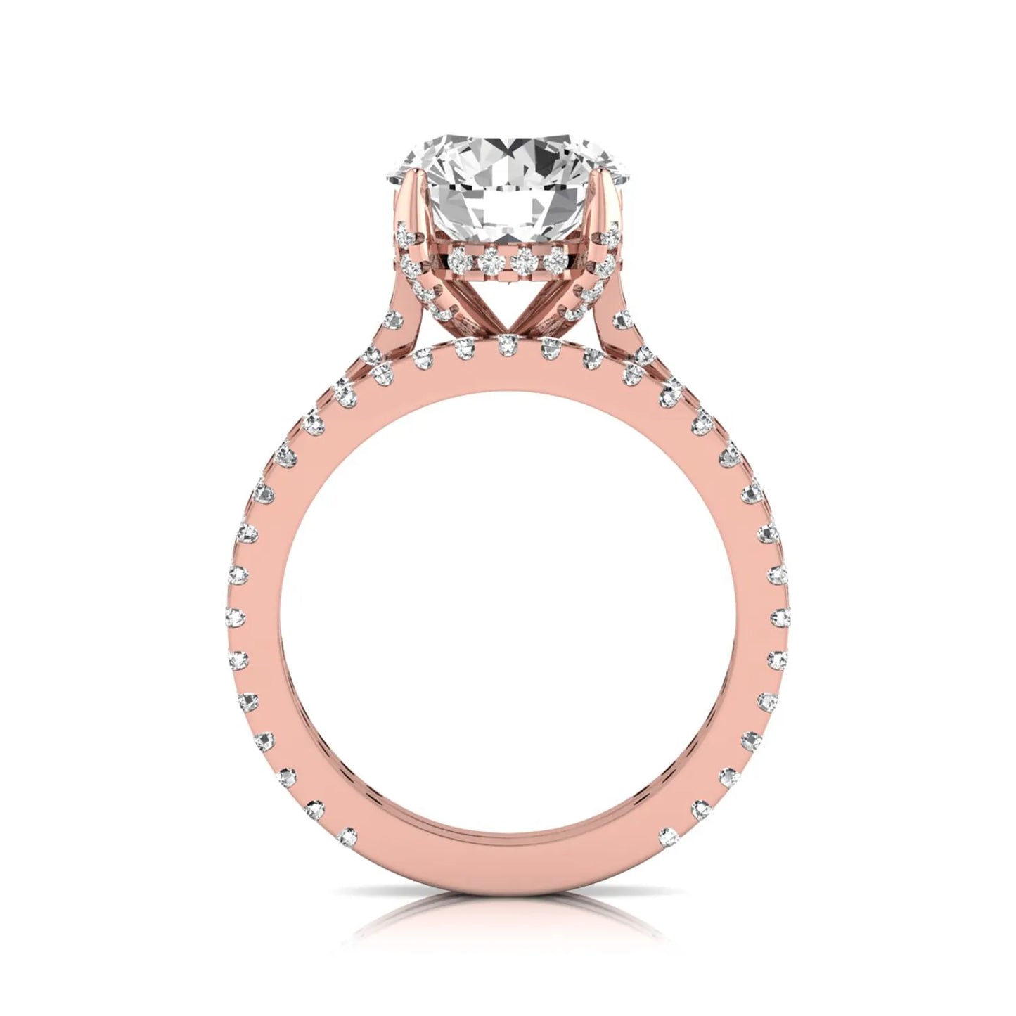 Round cut lab grown diamond bridal ring set featuring an IGI certified center diamond with matching pavé diamond wedding band in a classic four-prong setting in rose gold