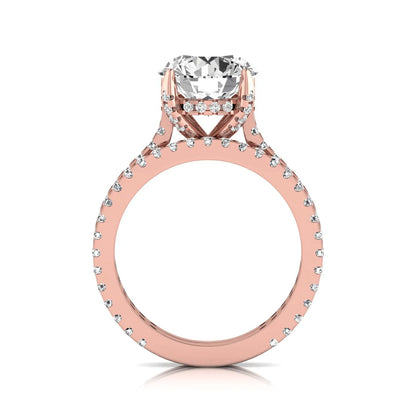 Round cut lab grown diamond bridal ring set featuring an IGI certified center diamond with matching pavé diamond wedding band in a classic four-prong setting in rose gold
