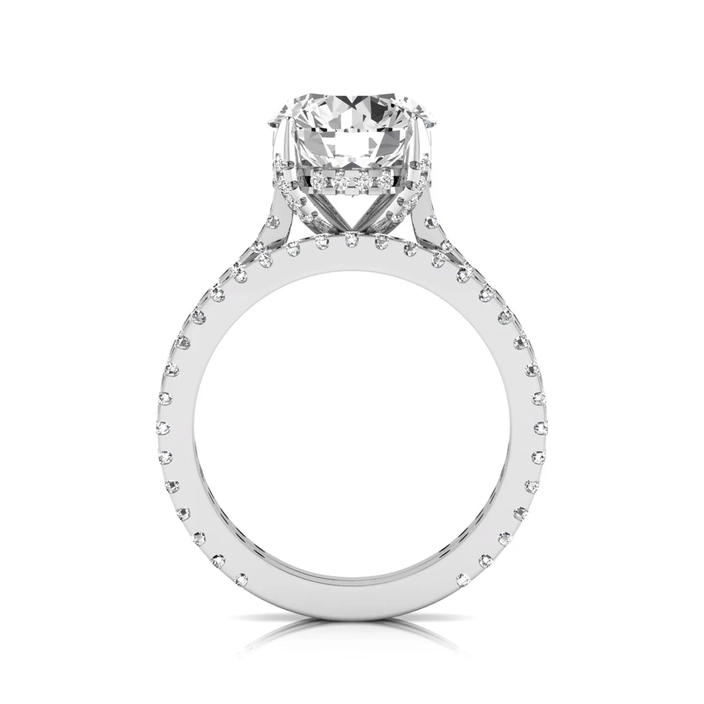 Round cut lab grown diamond bridal ring set featuring an IGI certified center diamond with matching pavé diamond wedding band in a classic four-prong setting in white gold