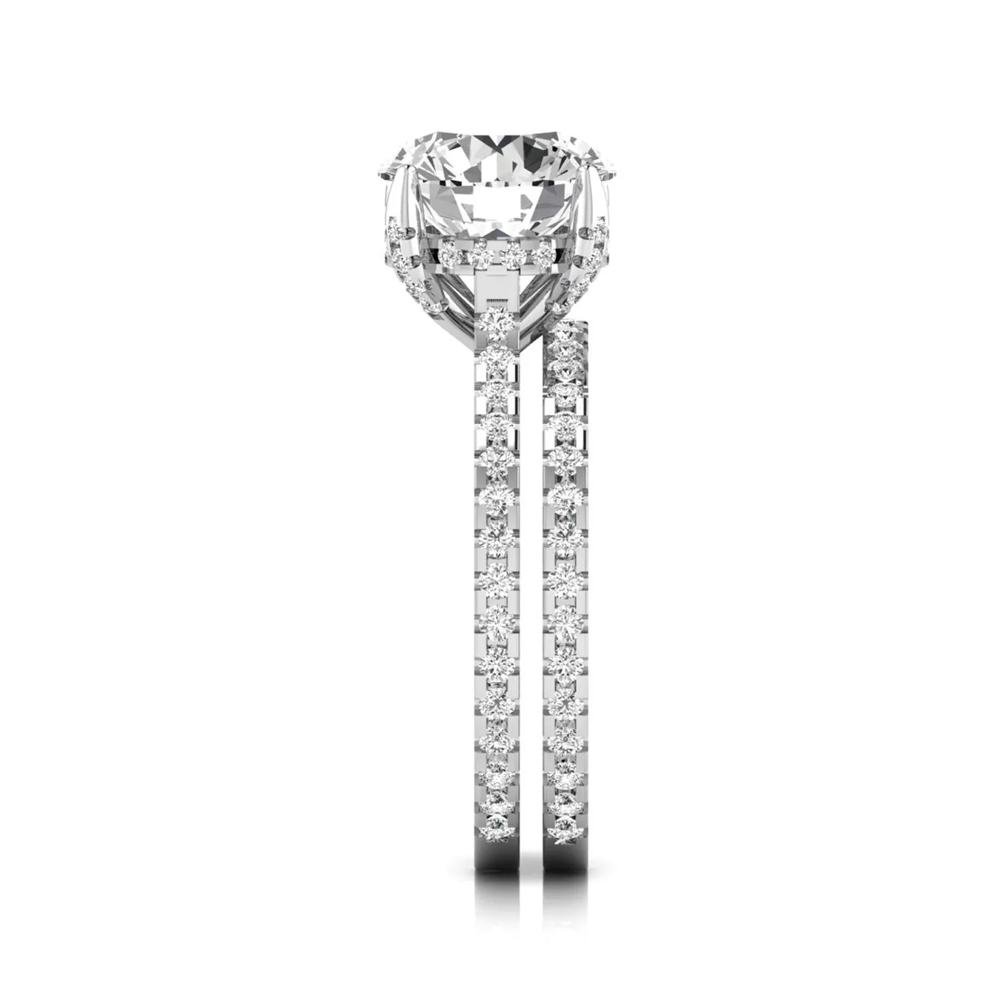 Round cut lab grown diamond bridal ring set featuring an IGI certified center diamond with matching pavé diamond wedding band in a classic four-prong setting in white gold