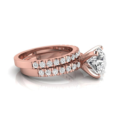 Round pavé lab grown diamond bridal ring set featuring a 2.75 carat IGI certified round center diamond with matching pavé diamond wedding band in a rose gold design.
