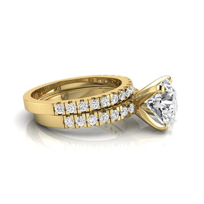 Round pavé lab grown diamond bridal ring set featuring a 2.75 carat IGI certified round center diamond with matching pavé diamond wedding band in a yellow gold design.