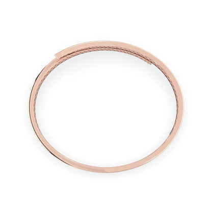 Round pavé set lab grown diamond bypass open cuff bangle bracelet with elegant sculptural crossover silhouette in rose gold metal tone