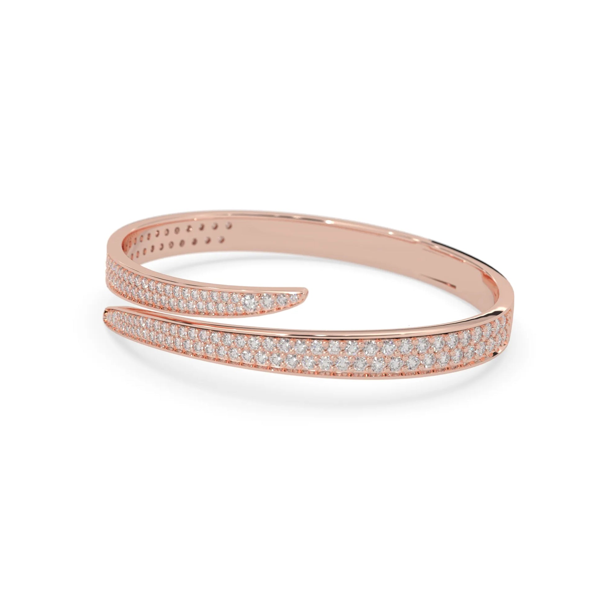 Round pavé set lab grown diamond bypass open cuff bangle bracelet with elegant sculptural crossover silhouette in rose gold metal tone
