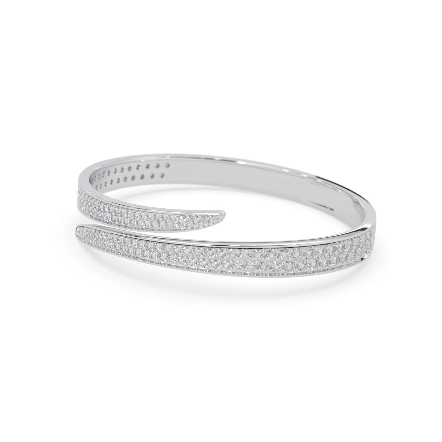 Round pavé set lab grown diamond bypass open cuff bangle bracelet with elegant sculptural crossover silhouette in white gold metal tone