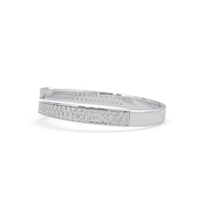 Round pavé set lab grown diamond bypass open cuff bangle bracelet with elegant sculptural crossover silhouette in white gold metal tone