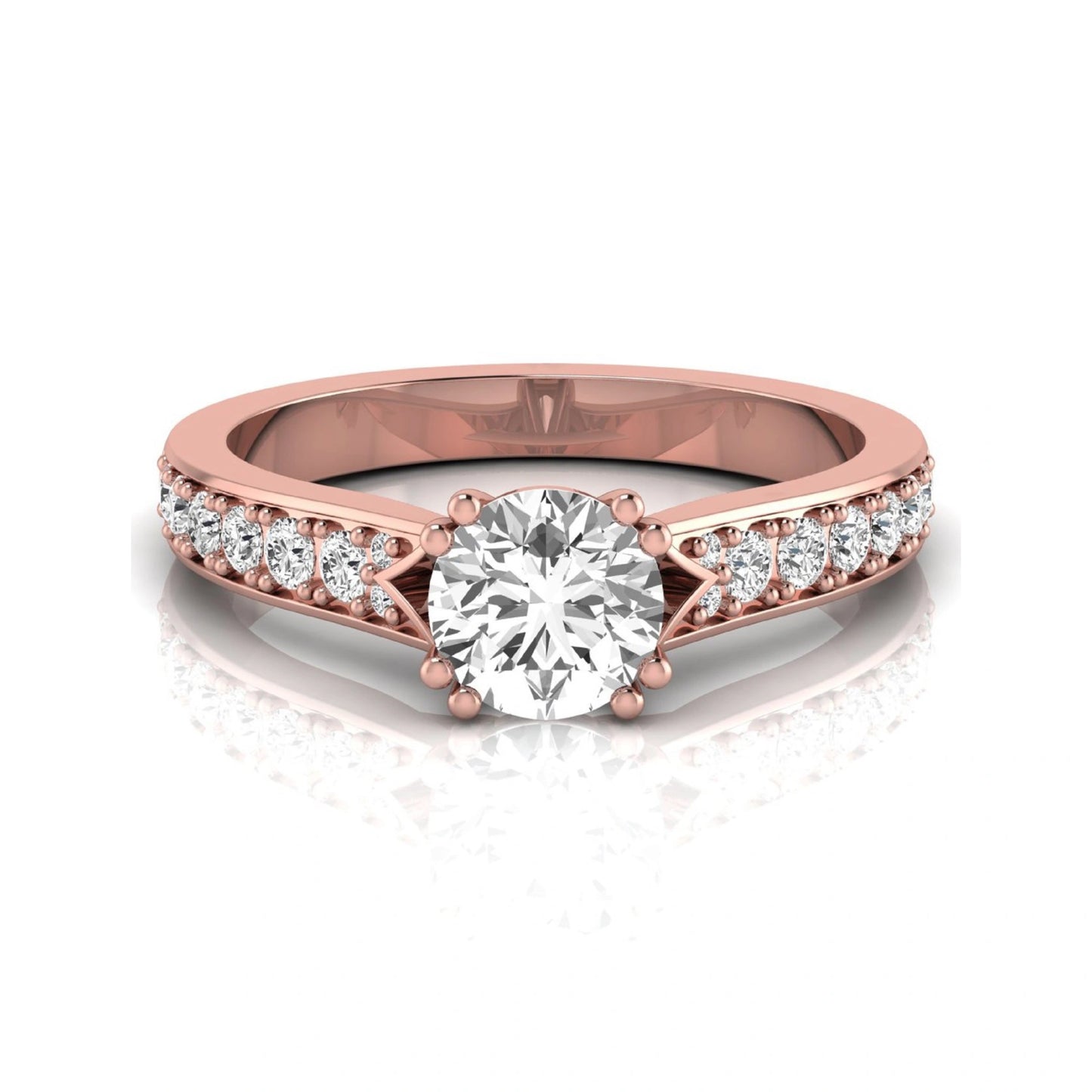 Round cut lab grown diamond engagement ring featuring an IGI certified center diamond with pavé set round diamonds on a tapered band in a classic six-prong setting in rose gold