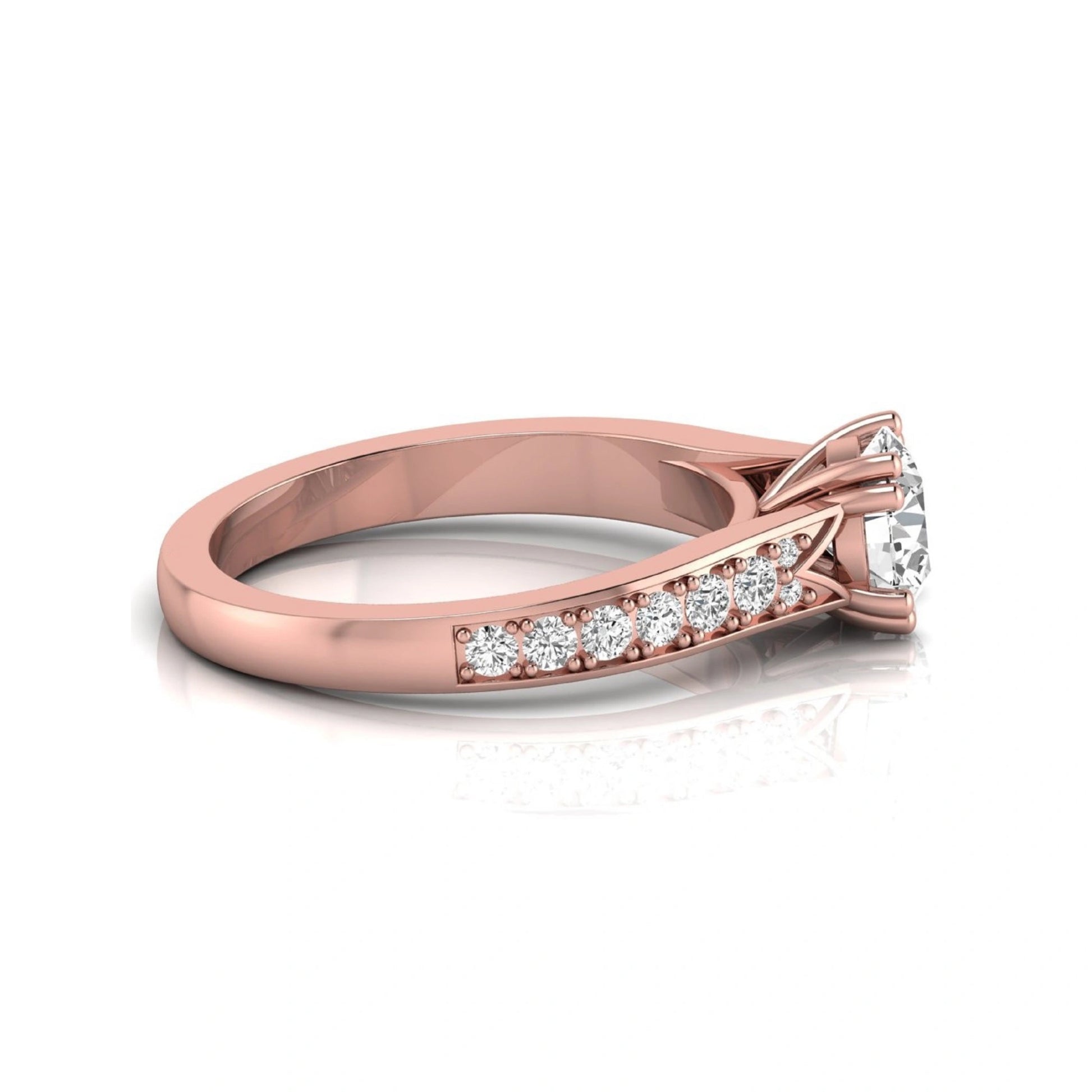 Round cut lab grown diamond engagement ring featuring an IGI certified center diamond with pavé set round diamonds on a tapered band in a classic six-prong setting in rose gold