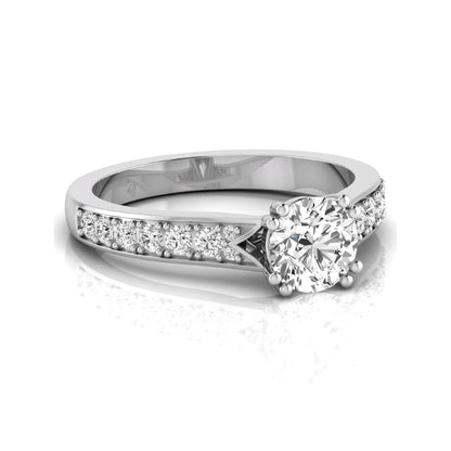 Round cut lab grown diamond engagement ring featuring an IGI certified center diamond with pavé set round diamonds on a tapered band in a classic six-prong setting in white gold