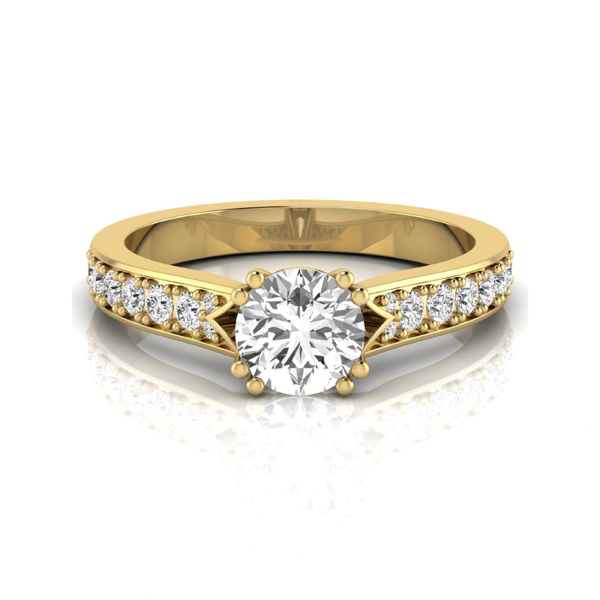 Round cut lab grown diamond engagement ring featuring an IGI certified center diamond with pavé set round diamonds on a tapered band in a classic six-prong setting in yellow gold