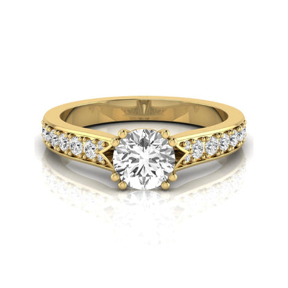 Round cut lab grown diamond engagement ring featuring an IGI certified center diamond with pavé set round diamonds on a tapered band in a classic six-prong setting in yellow gold