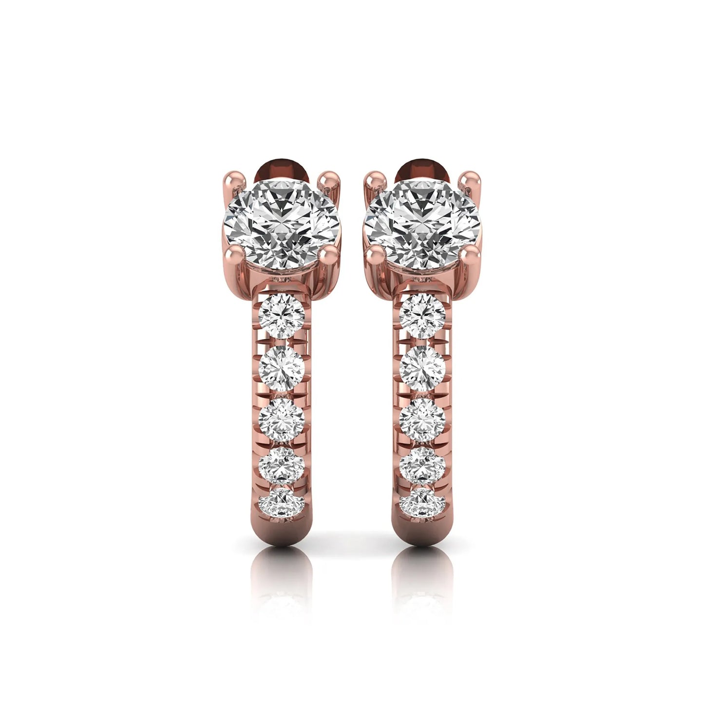 Round brilliant lab grown diamond huggie hoop earrings featuring an elevated four prong center diamond with graduated shared prong pavé round diamond accents in rose gold.