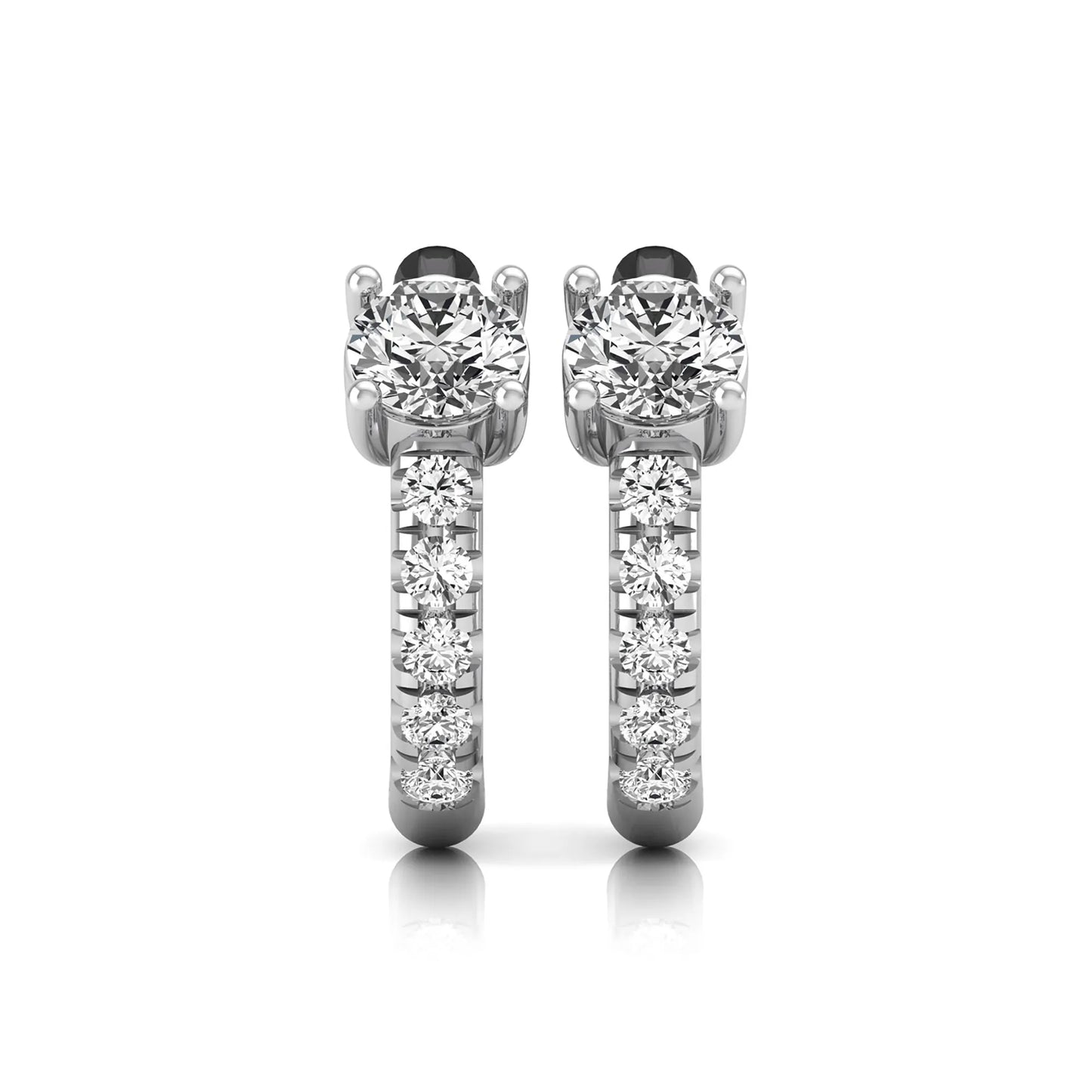 Round brilliant lab grown diamond huggie hoop earrings featuring an elevated four prong center diamond with graduated shared prong pavé round diamond accents in white gold.