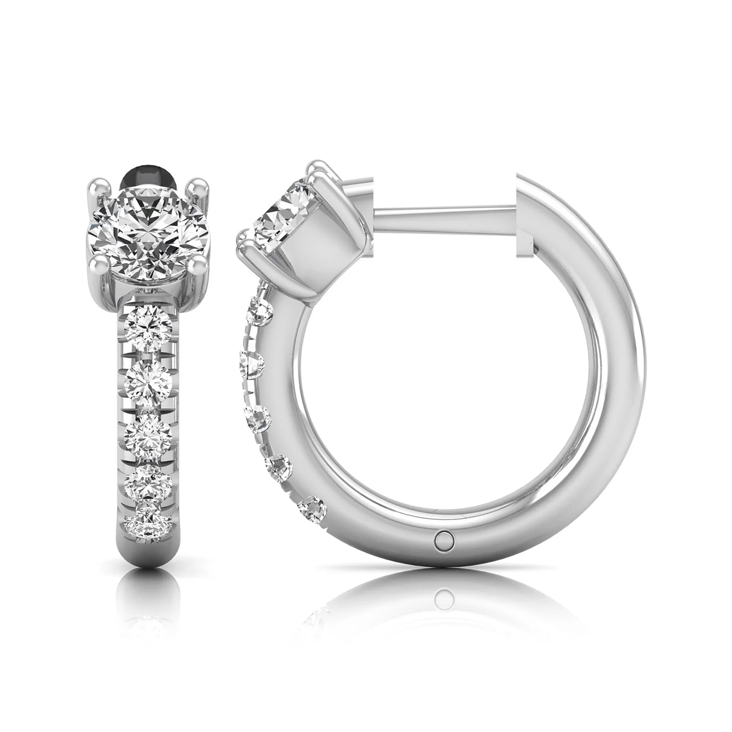 Round brilliant lab grown diamond huggie hoop earrings featuring an elevated four prong center diamond with graduated shared prong pavé round diamond accents in white gold.