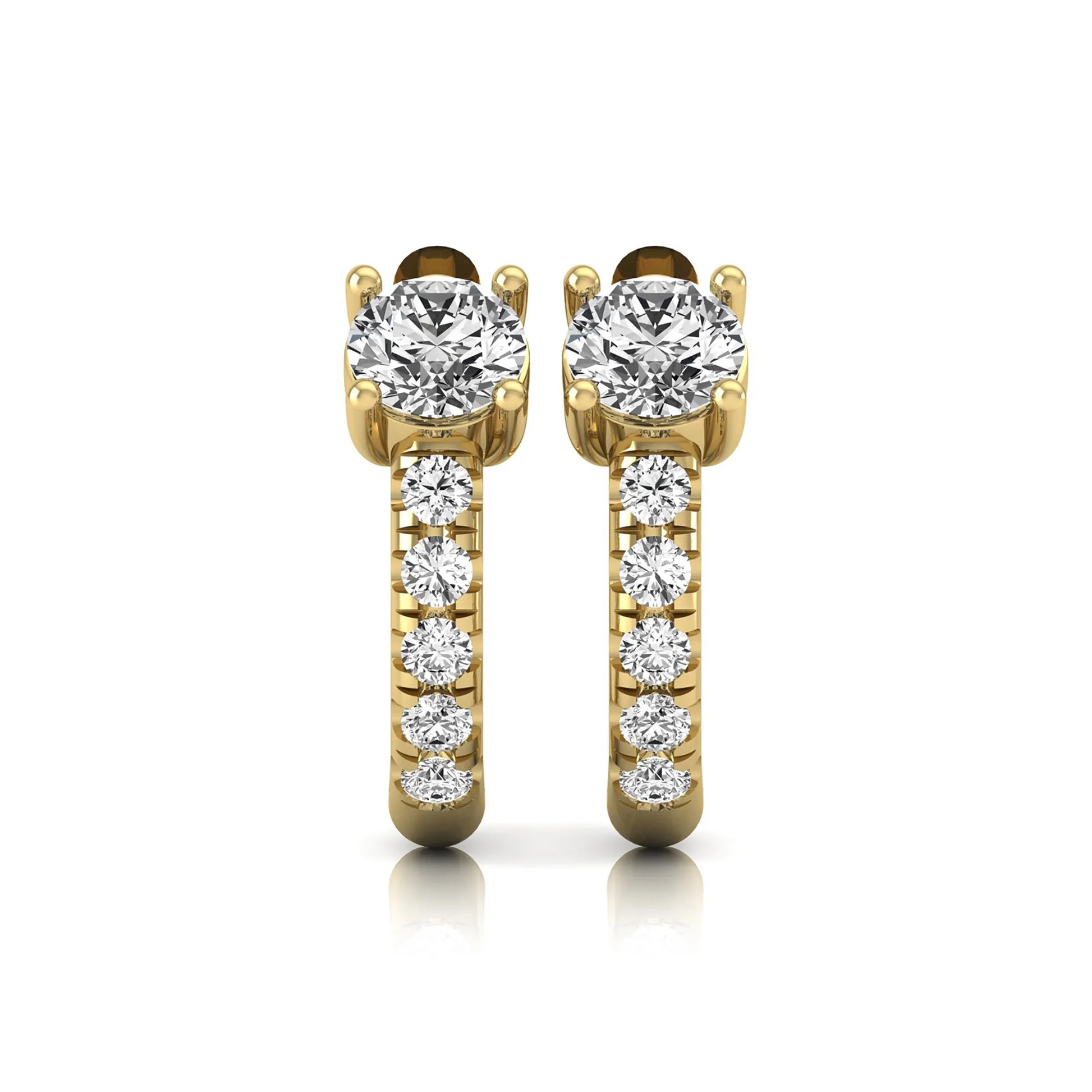 Round brilliant lab grown diamond huggie hoop earrings featuring an elevated four prong center diamond with graduated shared prong pavé round diamond accents in yellow gold.