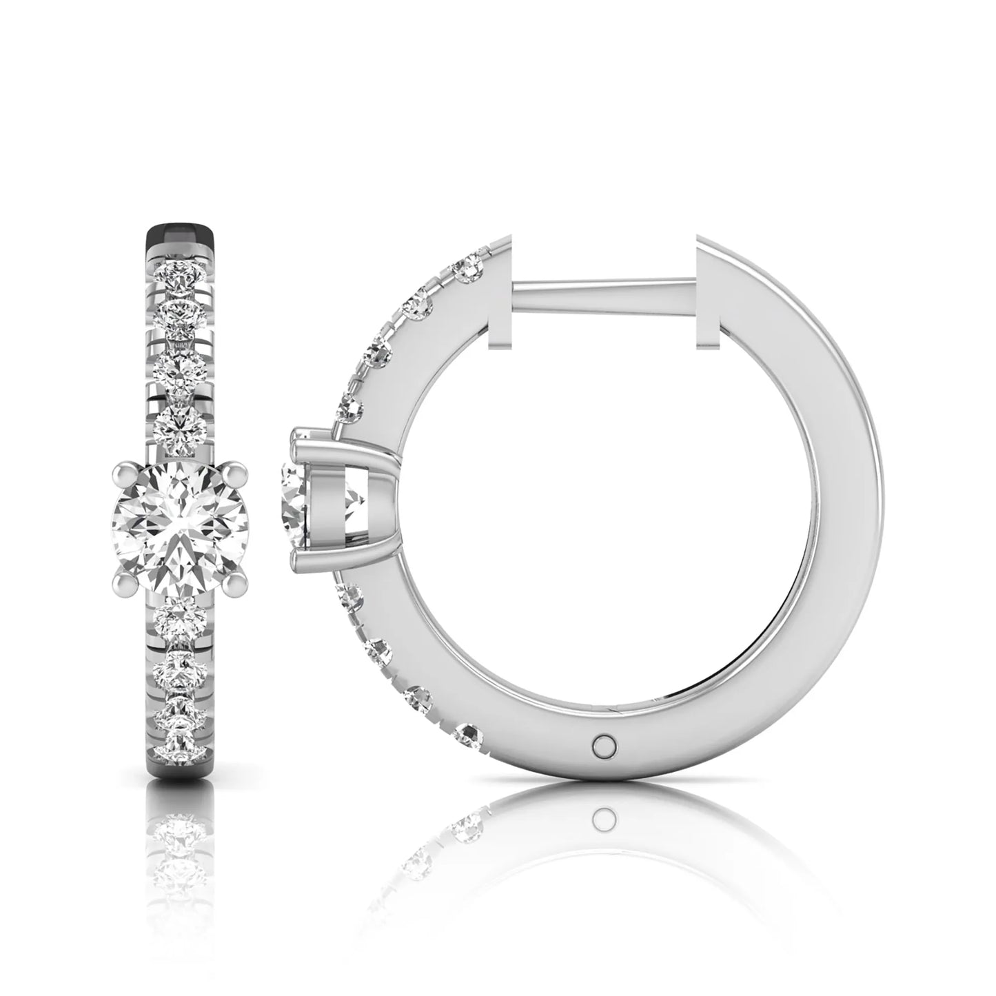 Round brilliant lab grown diamond pavé huggie hoop earrings featuring a four prong center diamond with graduated shared prong pavé round diamonds in white gold.
