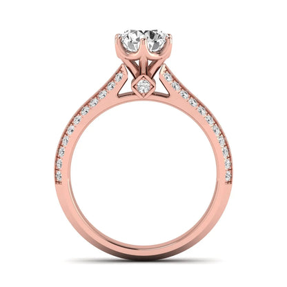 Round cut lab grown diamond engagement ring featuring a six-prong setting with pavé accent diamonds and rose gold finish.