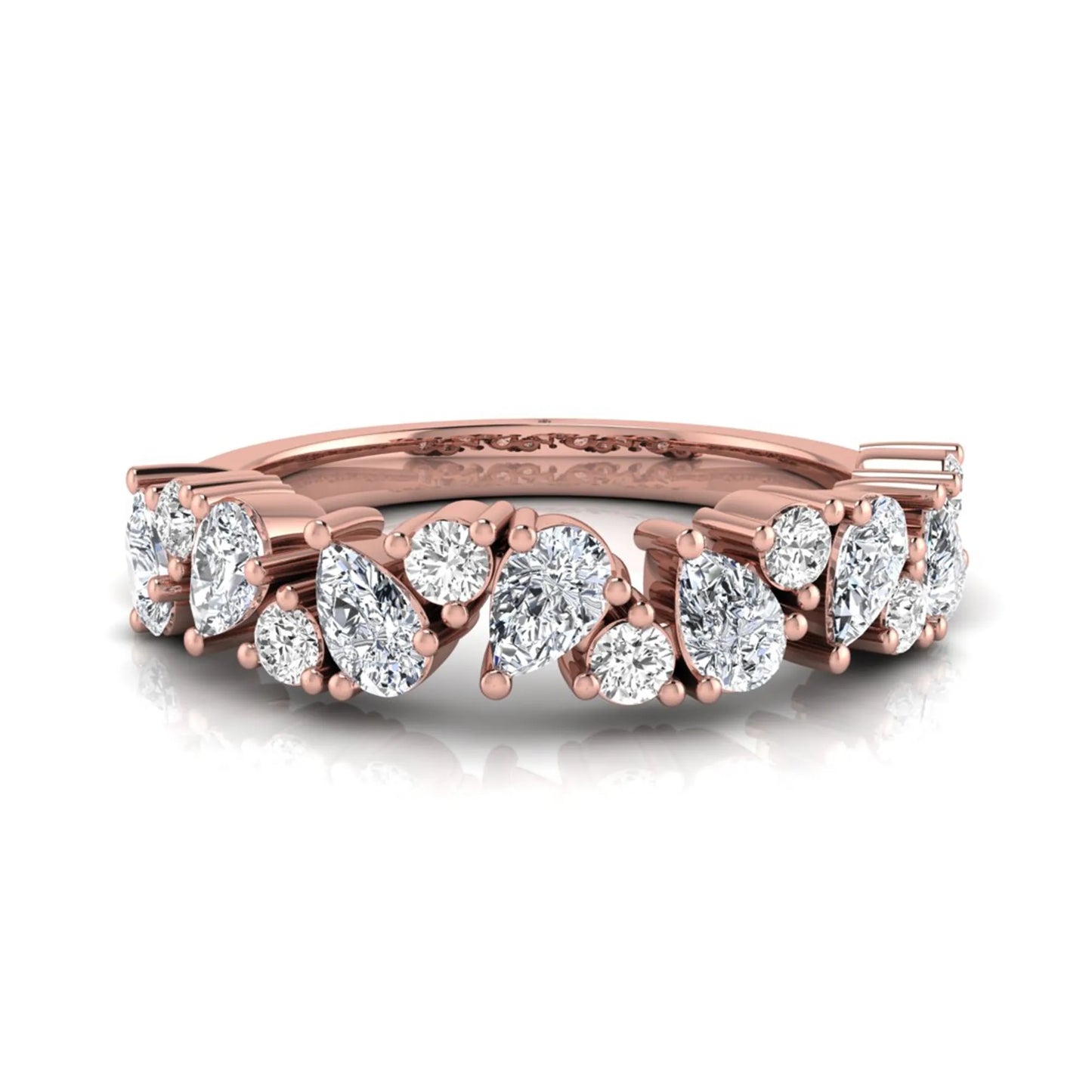 Round and pear cut lab grown diamond half eternity ring featuring alternating shared prong set diamonds in rose gold design