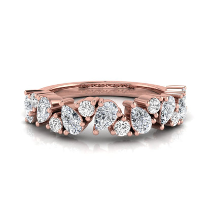 Round and pear cut lab grown diamond half eternity ring featuring alternating shared prong set diamonds in rose gold design