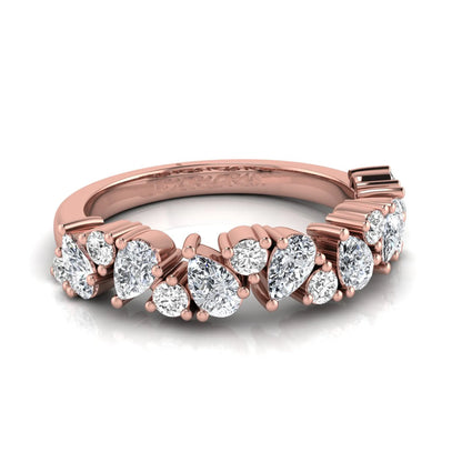 Round and pear cut lab grown diamond half eternity ring featuring alternating shared prong set diamonds in rose gold design