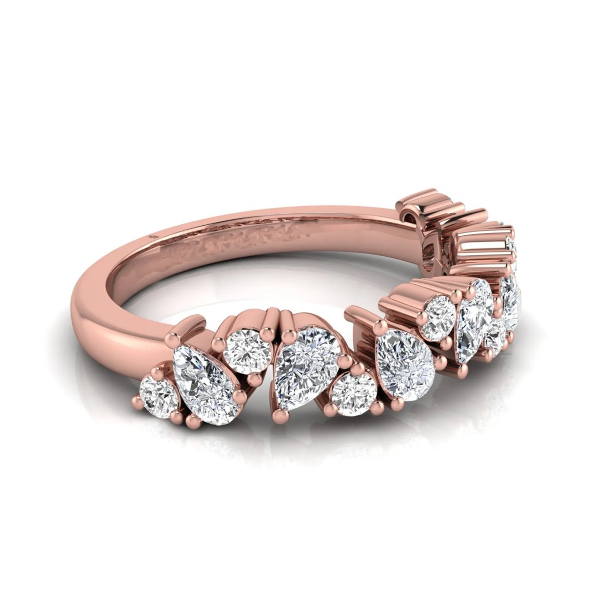 Round and pear cut lab grown diamond half eternity ring featuring alternating shared prong set diamonds in rose gold design