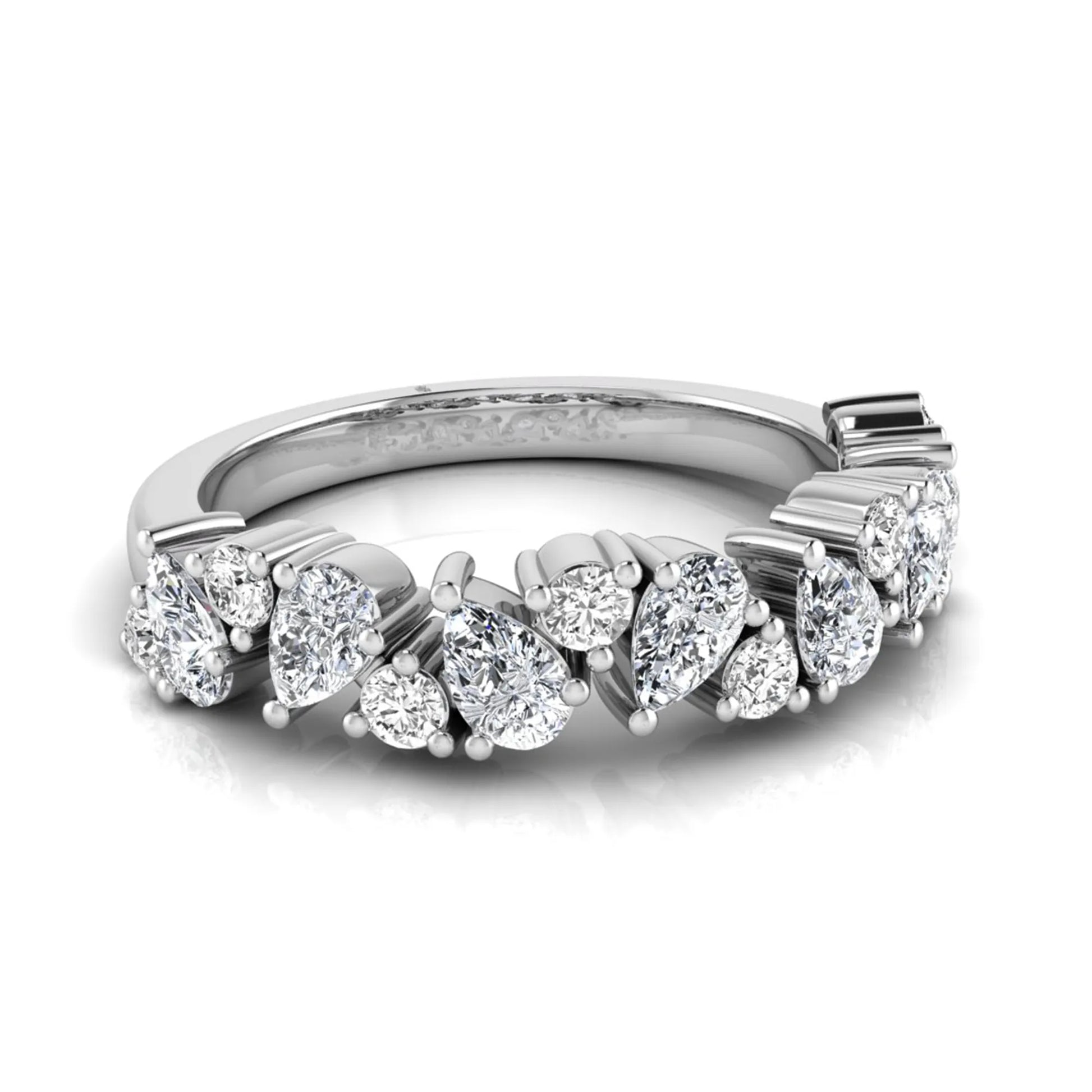 Round and pear cut lab grown diamond half eternity ring featuring alternating shared prong set diamonds in white gold design