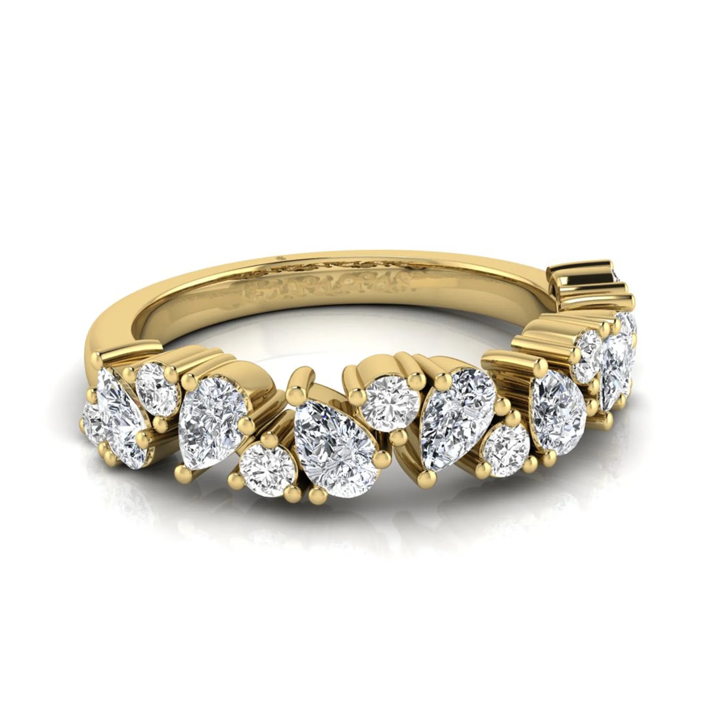 Round and pear cut lab grown diamond half eternity ring featuring alternating shared prong set diamonds in yellow gold design