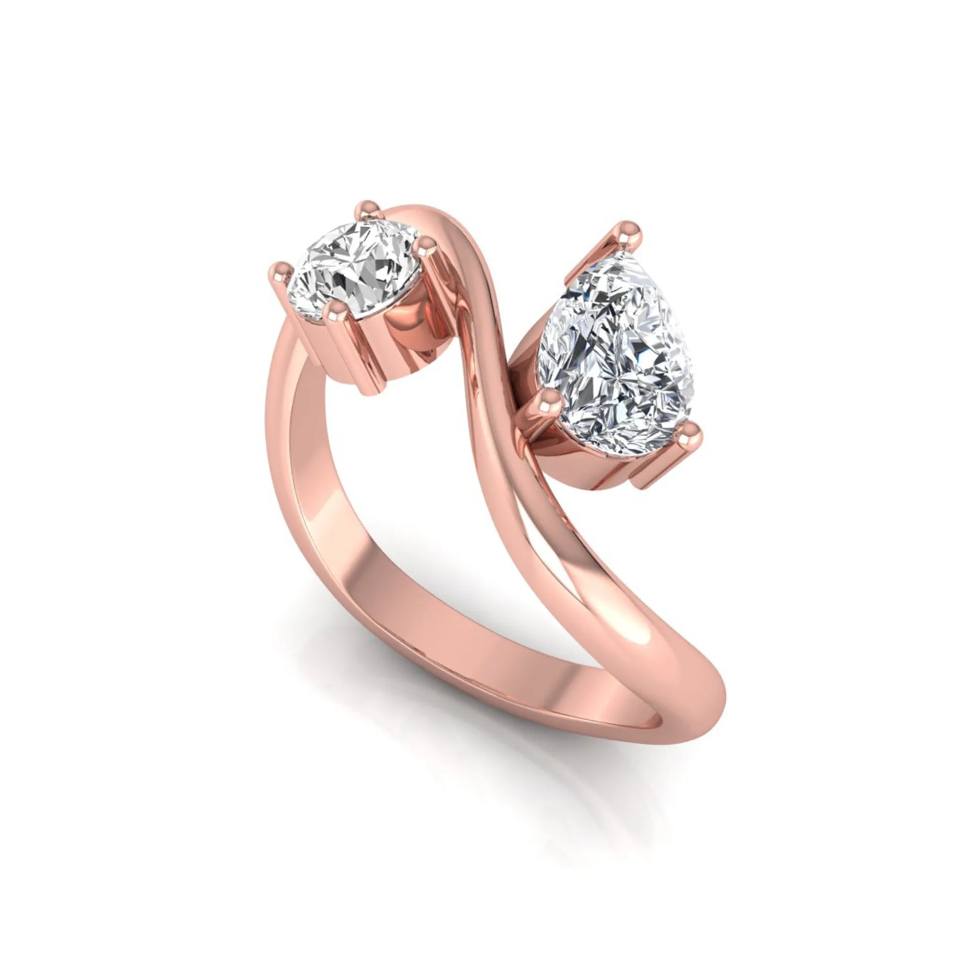 Round and pear cut lab grown diamond Toi et Moi ring with an elegant flowing crossover design in rose gold