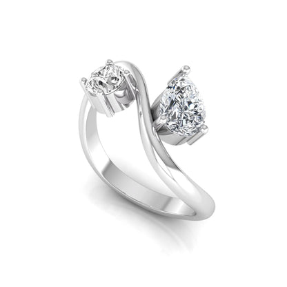 Round and pear cut lab grown diamond Toi et Moi ring with an elegant flowing crossover design in white gold