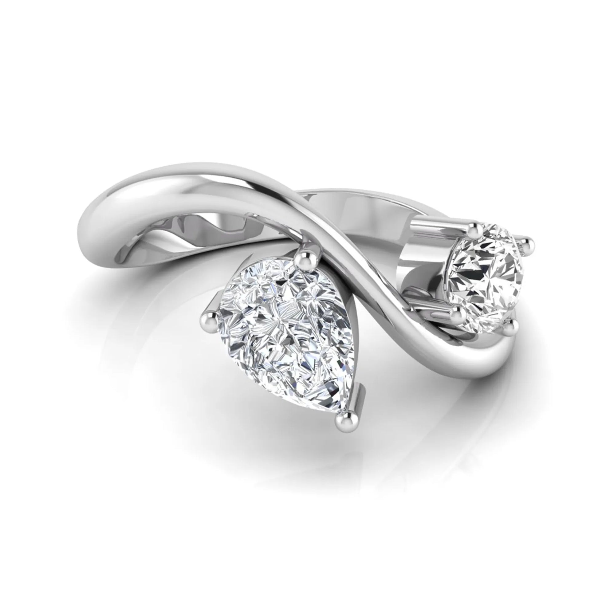 Round and pear cut lab grown diamond Toi et Moi ring with an elegant flowing crossover design in white gold
