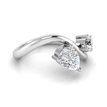 Round and pear cut lab grown diamond Toi et Moi ring with an elegant flowing crossover design in white gold