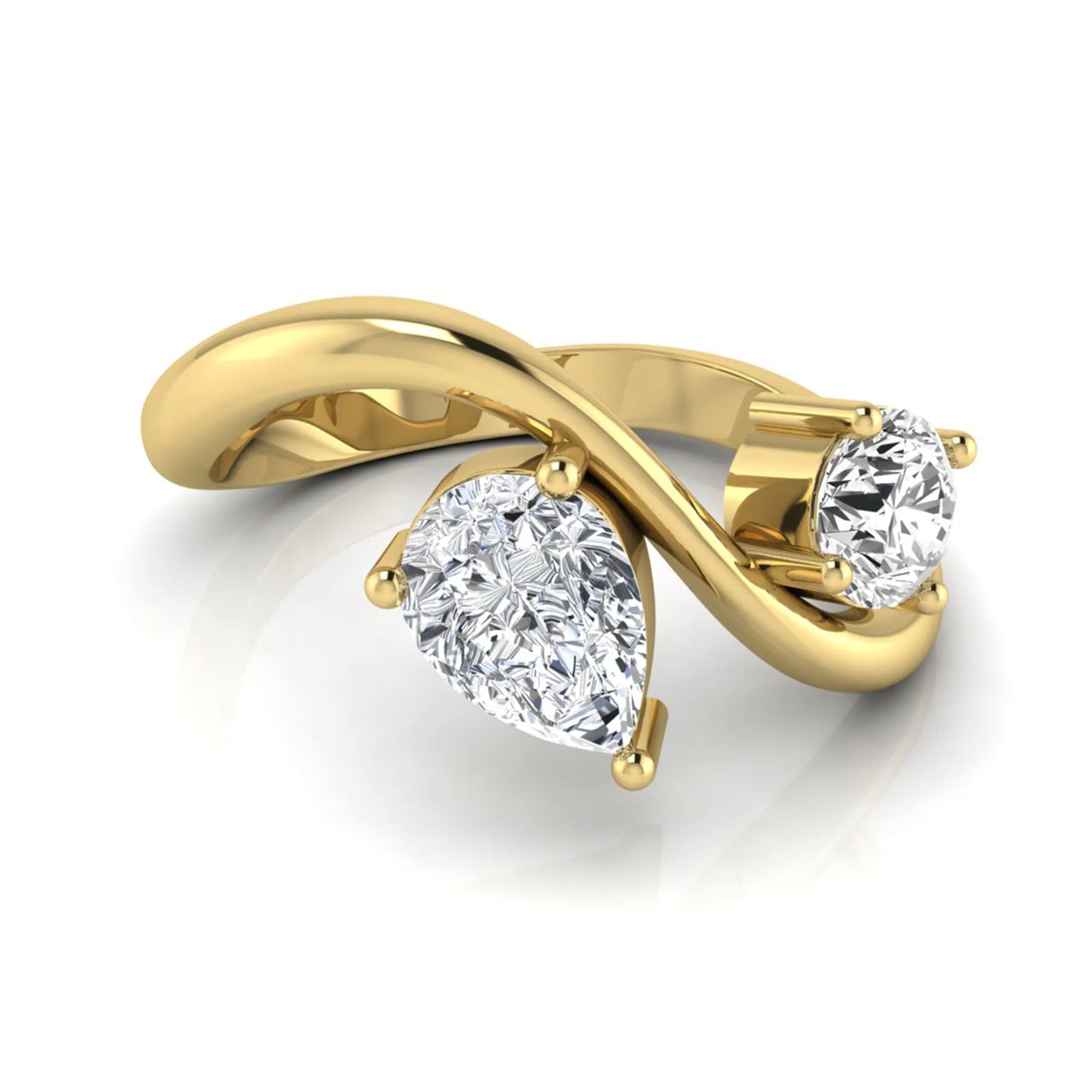 Round and pear cut lab grown diamond Toi et Moi ring with an elegant flowing crossover design in yellow gold