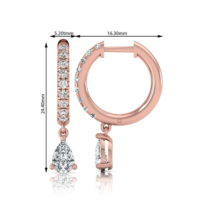 Round and pear cut lab grown diamond pavé drop huggie hoop earrings featuring a sparkling pear diamond drop, round pavé diamonds, hinged snap closure, and polished rose gold finish.