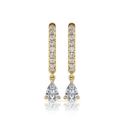 Round and pear cut lab grown diamond pavé drop huggie hoop earrings featuring a sparkling pear diamond drop, round pavé diamonds, hinged snap closure, and polished yellow gold finish.