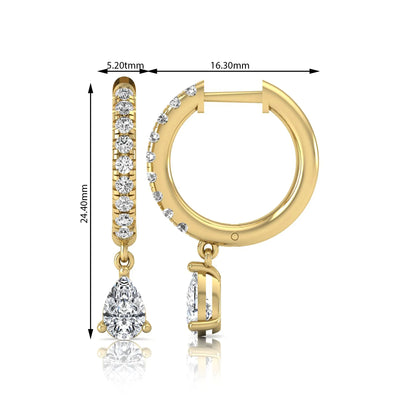 Round and pear cut lab grown diamond pavé drop huggie hoop earrings featuring a sparkling pear diamond drop, round pavé diamonds, hinged snap closure, and polished yellow gold finish.