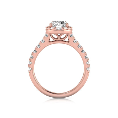 Round cut lab grown diamond engagement ring with a pear-shaped halo of round diamonds, pavé side stones, and a rose gold style band.