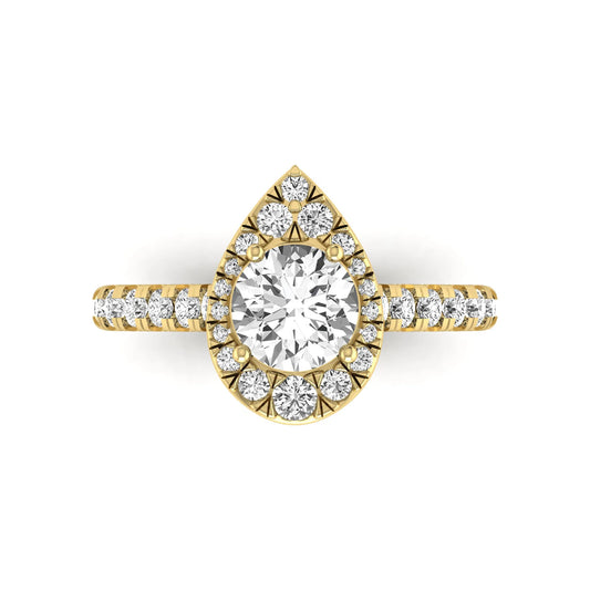 Round cut lab grown diamond engagement ring with a pear-shaped halo of round diamonds, pavé side stones, and a yellow gold style band.