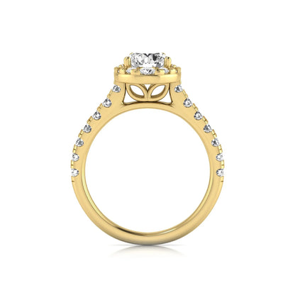 Round cut lab grown diamond engagement ring with a pear-shaped halo of round diamonds, pavé side stones, and a yellow gold style band.