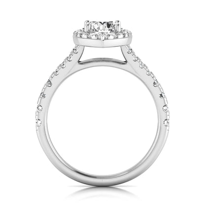 Round cut lab grown diamond engagement ring with a pear-shaped halo, split shank pavé band, and white gold style.