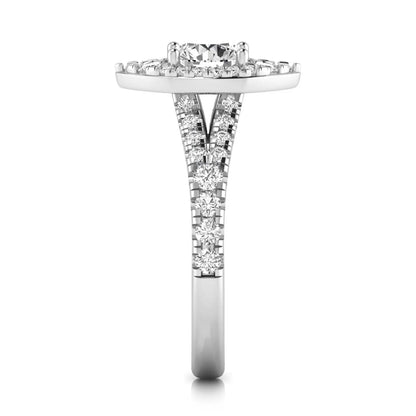 Round cut lab grown diamond engagement ring with a pear-shaped halo, split shank pavé band, and white gold style.