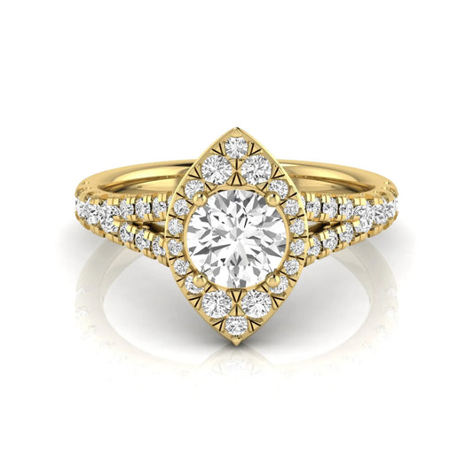 Round cut lab grown diamond engagement ring with a pear-shaped halo, split shank pavé band, and yellow gold style.