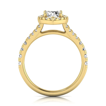 Round cut lab grown diamond engagement ring with a pear-shaped halo, split shank pavé band, and yellow gold style.