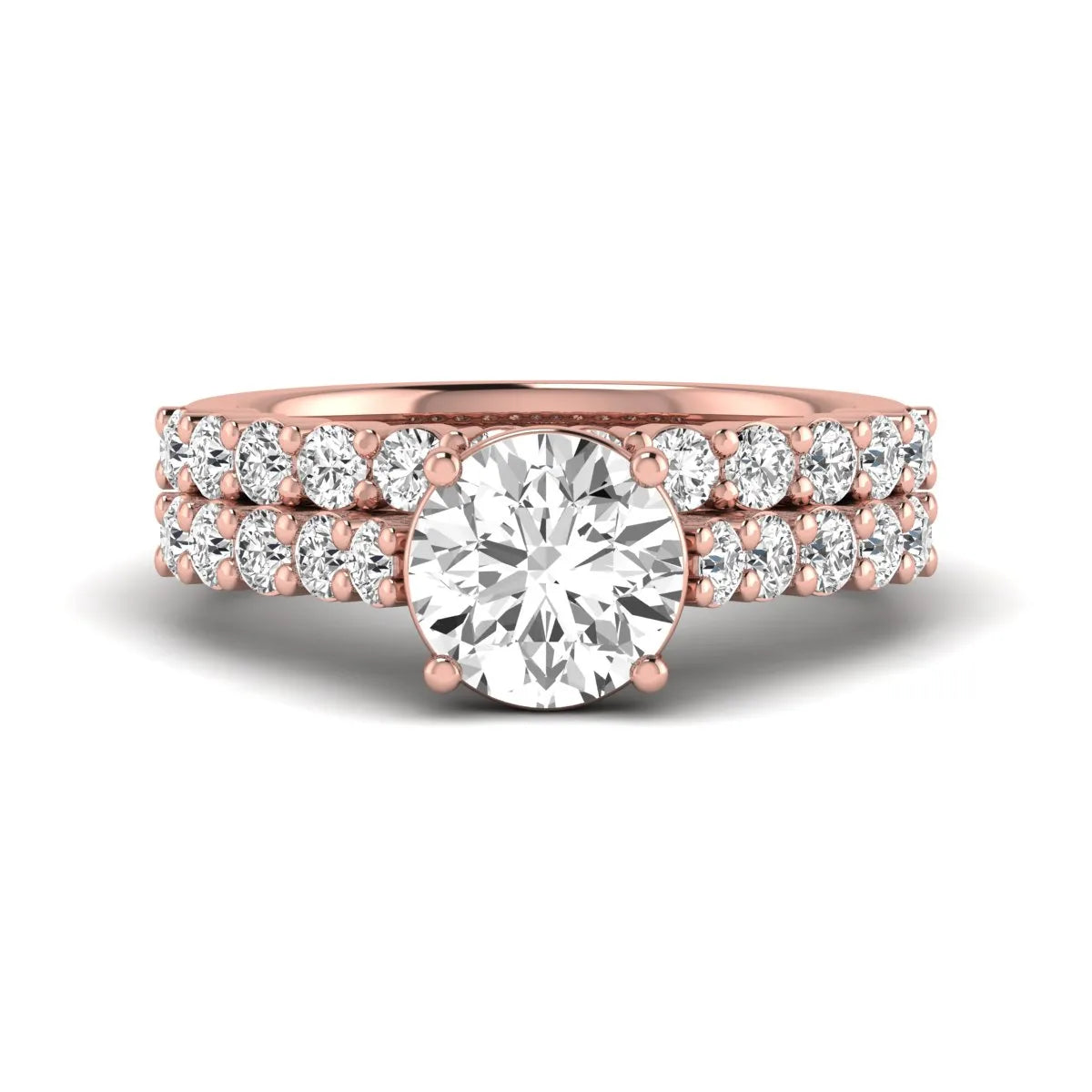 Round prong set lab grown diamond bridal ring set featuring a 2.00 carat round center diamond with matching round diamond bands in rose gold finish.