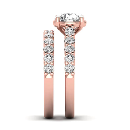 Round prong set lab grown diamond bridal ring set featuring a 2.00 carat round center diamond with matching round diamond bands in rose gold finish.