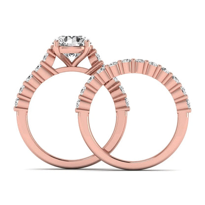 Round prong set lab grown diamond bridal ring set featuring a 2.00 carat round center diamond with matching round diamond bands in rose gold finish.