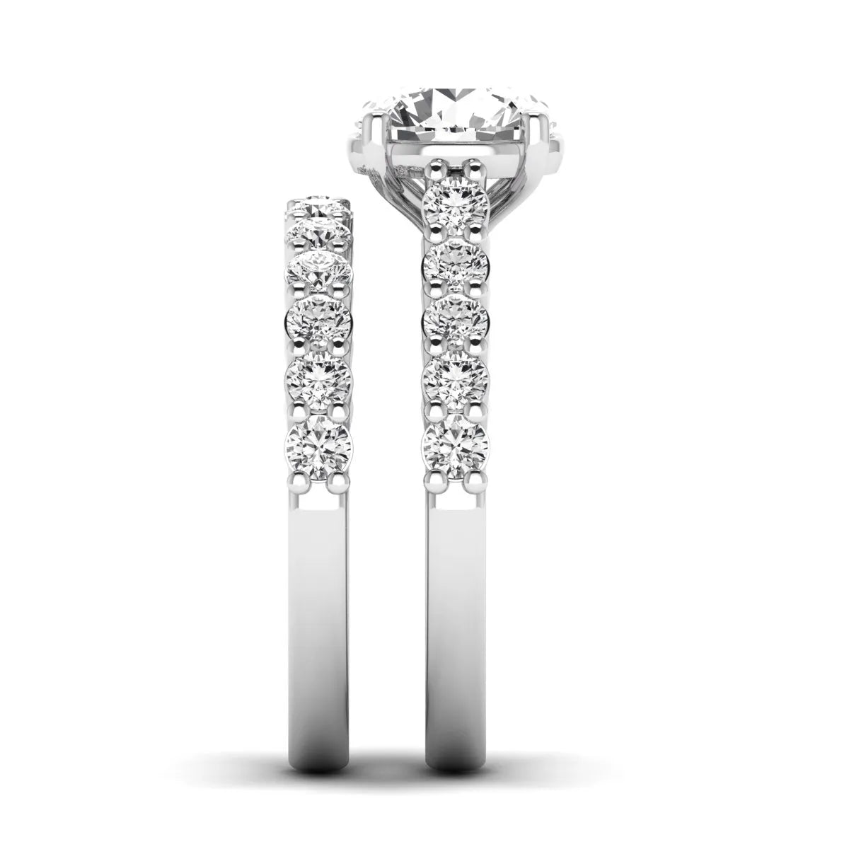 Round prong set lab grown diamond bridal ring set featuring a 2.00 carat round center diamond with matching round diamond bands in white gold finish.