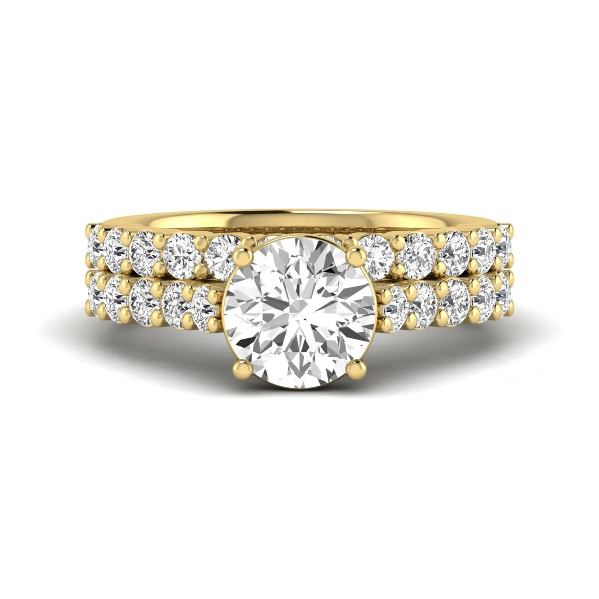 Round prong set lab grown diamond bridal ring set featuring a 2.00 carat round center diamond with matching round diamond bands in yellow gold finish.