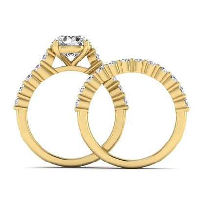 Round prong set lab grown diamond bridal ring set featuring a 2.00 carat round center diamond with matching round diamond bands in yellow gold finish.