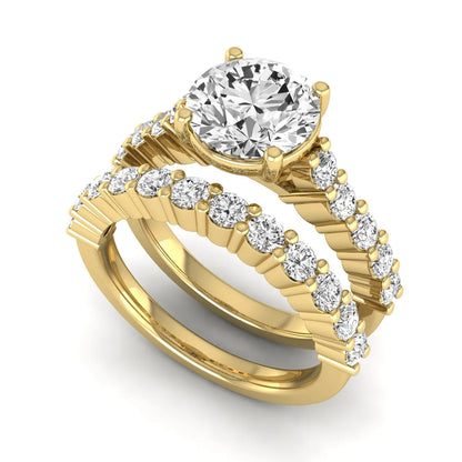 Round prong set lab grown diamond bridal ring set featuring a 2.00 carat round center diamond with matching round diamond bands in yellow gold finish.