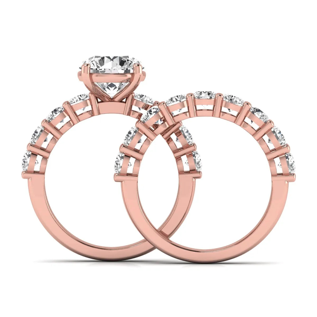 Round prong set lab grown diamond bridal ring set featuring a 2.50 carat round center diamond with double-row round accent diamonds in rose gold finish.